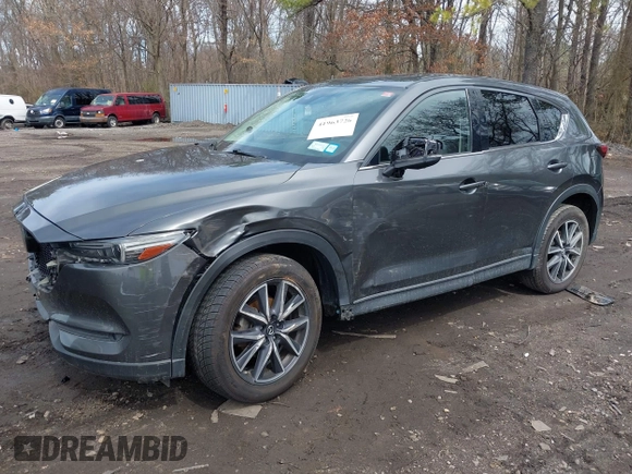 2018 Mazda CX-5 Grand Touring with VIN JM3KFBDM6J0388540, listed as a IAAI auction lot 41963726 with 103,148 mi miles. Bid and sale history available at carsss.com. Image 2.