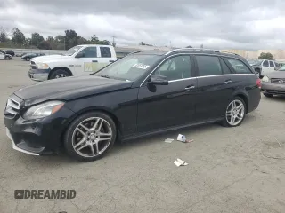 2015 Mercedes-Benz E 350 Luxury with VIN WDDHH8JB0FB083412, listed as a Copart auction lot 52053855 with 117,040 mi miles and Salvage title. Bid and sale history available at DreamBid. Image 1.