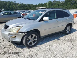 2006 Lexus RX 330 with VIN 2T2GA31U46C045659, listed as a Copart auction lot 60987985 with 122,714 mi miles and Salvage title. Bid and sale history available at DreamBid. Image 1.