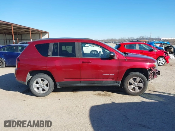 2014 Jeep Compass Sport with VIN 1C4NJCBA3ED812435, listed as a IAAI auction lot 41424374 with 174,663 mi miles and . Bid and sale history available at DreamBid. Image 14.