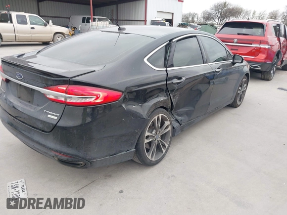2017 Ford Fusion Titanium with VIN 3FA6P0K9XHR187444, listed as a IAAI auction lot 41753374 with 88,029 mi miles. Bid and sale history available at carsss.com. Image 4.