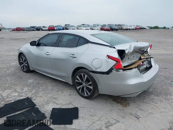 2016 Nissan Maxima SR with VIN 1N4AA6AP8GC407031, listed as a IAAI auction lot 42453395 with 204,155 mi miles and . Bid and sale history available at DreamBid. Image 3.