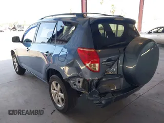 2007 Toyota RAV4 Limited with VIN JTMZK34V975011438, listed as a IAAI auction lot 42643034 with 163,616 mi miles and . Bid and sale history available at DreamBid. Image 3.