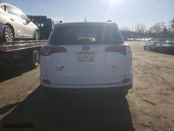2018 Toyota RAV4 LE with VIN JTMZFREV2JJ737551, listed as a Copart auction lot 88305435 with 133,032 mi miles and Salvage Title. Bid and sale history available at carsss.com. Image 6.