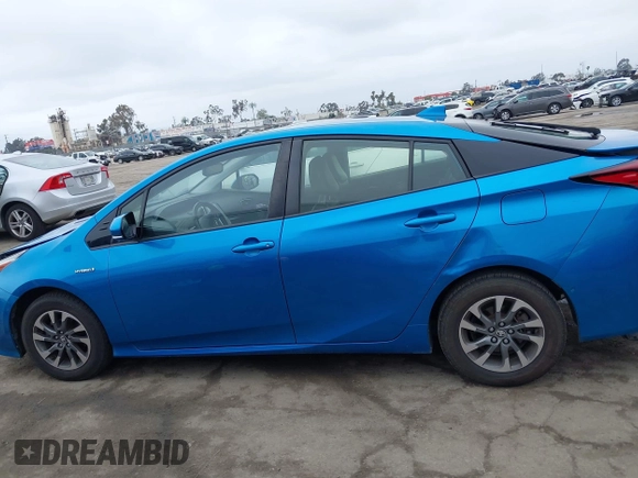 2020 Toyota Prius L Eco z VIN JTDKARFU9L3104395, wystawiony jako IAAI lot #42207156 z przebiegiem 85 572 mil mil oraz . Historia ofert i sprzedaży dostępna na DreamBid. Obrazek 14.