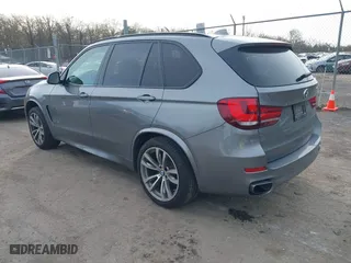 2018 BMW X5 xDrive35i with VIN 5UXKR0C50J0X92561, listed as a IAAI auction lot 41866445 with 56,918 mi miles. Bid and sale history available at carsss.com. Image 3.