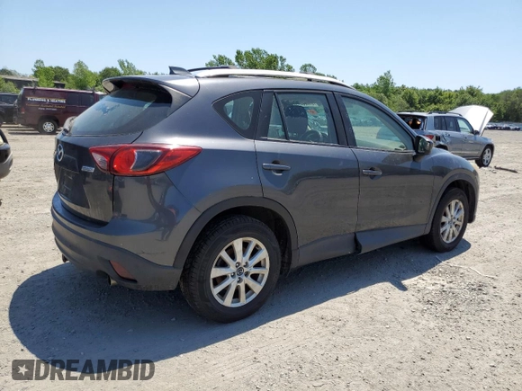 2014 Mazda CX-5 Sport with VIN JM3KE4BE6E0350595, listed as a Copart auction lot 61826475 with Not provided miles and Clean title. Bid and sale history available at DreamBid. Image 3.