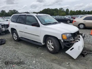 2005 GMC Envoy SLT with VIN 1GKDS13S652330496, listed as a Copart auction lot 73317234 with 191,138 mi miles and Salvage Title. Bid and sale history available at carsss.com. Image 4.