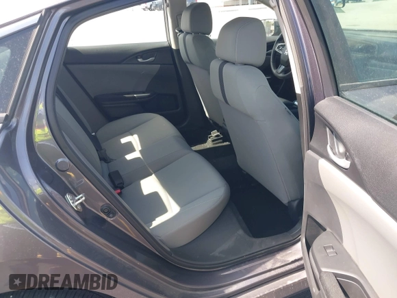 2020 Honda Civic LX with VIN 19XFC2F68LE007735, listed as a IAAI auction lot 42215294 with 3,849 mi miles and . Bid and sale history available at DreamBid. Image 8.