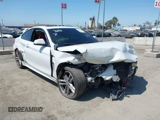 2019 BMW 4 Series 430i with VIN WBA4W3C5XKAF92884, listed as a IAAI auction lot 40310329 with 95,091 mi miles and . Bid and sale history available at DreamBid. Image 1.