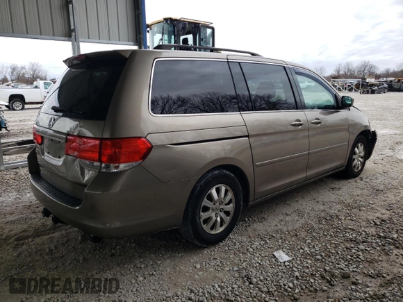 2010 Honda Odyssey EX with VIN 5FNRL3H59AB038104, listed as a Copart auction lot 84688894 with 317,028 mi miles and Salvage title. Bid and sale history available at DreamBid. Image 3.