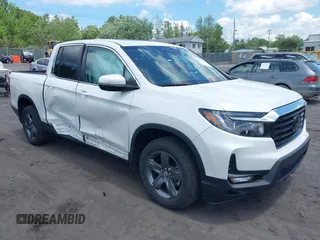 2022 Honda Ridgeline RTL z VIN 5FPYK3F55NB005809, wystawiony jako IAAI lot #42550686 z przebiegiem 16 275 mil mil oraz . Historia ofert i sprzedaży dostępna na DreamBid. Obrazek 1.