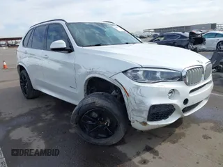 2017 BMW X5 xDrive50i z VIN 5UXKR6C3XH0J85028, wystawiony jako IAAI lot #41889220 z przebiegiem 107 105 mil mil oraz . Historia ofert i sprzedaży dostępna na DreamBid. Obrazek 1.