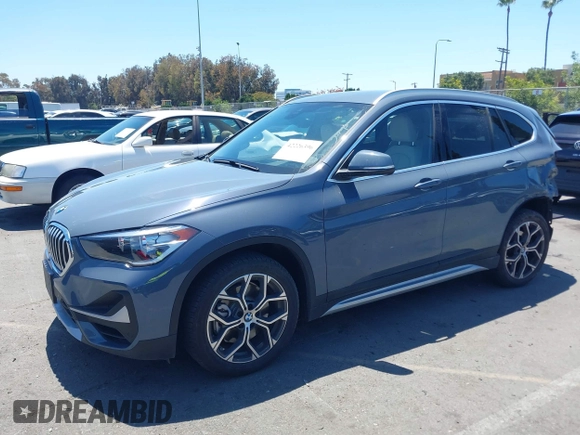 2021 BMW X1 sDrive28i z VIN WBXJG7C02M5T37169, wystawiony jako IAAI lot #42226396 z przebiegiem 48 603 mil mil oraz . Historia ofert i sprzedaży dostępna na DreamBid. Obrazek 20.