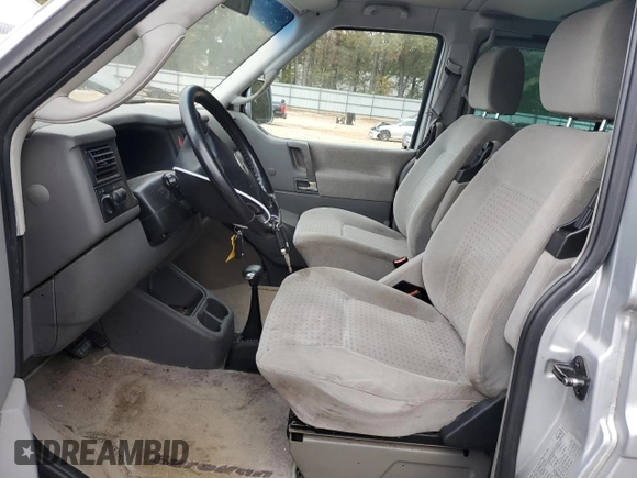 2002 Volkswagen EuroVan с VIN WV2KB47022H065941, выставлен на аукционе Copart как лот 79238234 с пробегом Не указан миль и Чистый • Clean title. История ставок и продаж доступна на DreamBid. Изображение 7.