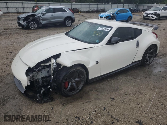 2014 Nissan 370Z with VIN JN1AZ4EH2EM633845, listed as a Copart auction lot 63583194 with 0 mi miles and Salvage Title. Bid and sale history available at carsss.com. Image 1.