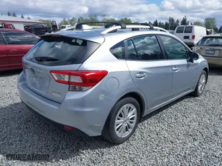 2017 Subaru Impreza Premium with VIN 4S3GTAB67H3753287, listed as a IAAI auction lot 42075877 with 55,247 mi miles. Bid and sale history available at carsss.com. Image 4.
