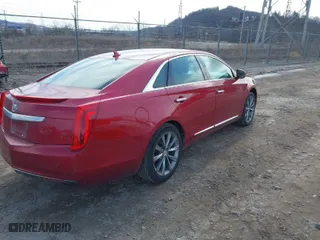 2013 Cadillac XTS with VIN 2G61N5S37D9177217, listed as a IAAI auction lot 41747566 with 140,946 mi miles. Bid and sale history available at carsss.com. Image 4.