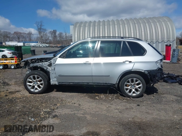 2012 BMW X5 35i с VIN 5UXZV4C56CL986384, выставлен на аукционе IAAI как лот 41986665 с пробегом Не указан миль и . История ставок и продаж доступна на DreamBid. Изображение 14.