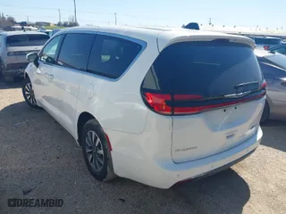 2023 Chrysler Pacifica Hybrid Touring L with VIN 2C4RC1L74PR579720, listed as a IAAI auction lot 41762445 with 38,095 mi miles. Bid and sale history available at carsss.com. Image 3.