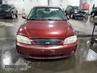 2003 Kia Spectra with VIN KNAFB121735217341, listed as a Copart auction lot 72016504 with 116,224 mi miles and Salvage Title. Bid and sale history available at DreamBid. Image 5.