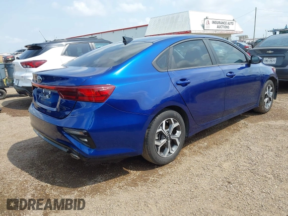 2021 Kia Forte LXS with VIN 3KPF24AD5ME384836, listed as a IAAI auction lot 42098713 with 29,107 mi miles and . Bid and sale history available at DreamBid. Image 4.