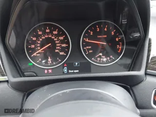 2016 BMW X1 xDrive28i with VIN WBXHT3C3XG5E51358, listed as a IAAI auction lot 41730597 with 90,010 mi miles. Bid and sale history available at carsss.com. Image 7.
