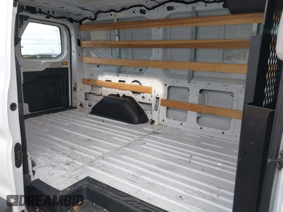 2021 Ford Transit Cargo with VIN 1FTBR1Y81MKA25014, listed as a IAAI auction lot 41594717 with 49,983 mi miles and . Bid and sale history available at DreamBid. Image 8.