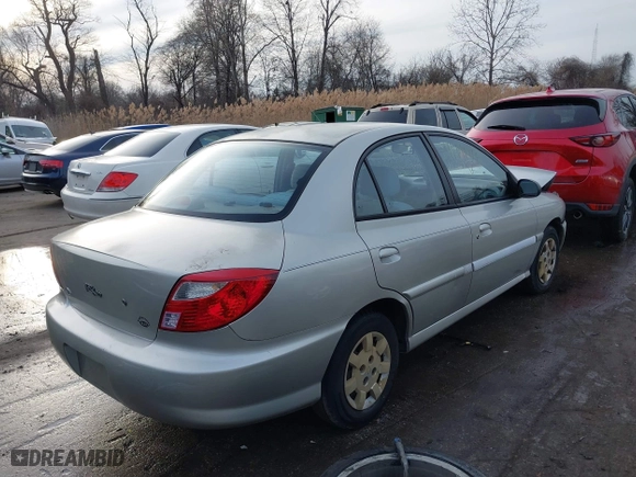 2001 Kia Rio with VIN KNADC123716042067, listed as a IAAI auction lot 41449479 with 113,108 mi miles. Bid and sale history available at carsss.com. Image 4.