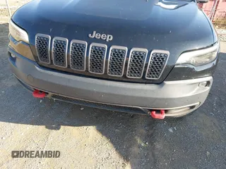 2019 Jeep Cherokee Trailhawk with VIN 1C4PJMBX3KD483895, listed as a IAAI auction lot 42696774 with 122,932 mi miles and . Bid and sale history available at DreamBid. Image 6.