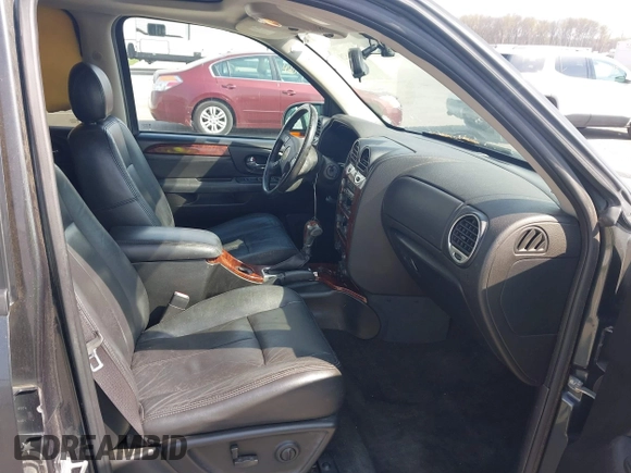 2005 GMC Envoy SLE with VIN 1GKDT13S052299632, listed as a IAAI auction lot 41966628 with 199,312 mi miles and . Bid and sale history available at DreamBid. Image 5.
