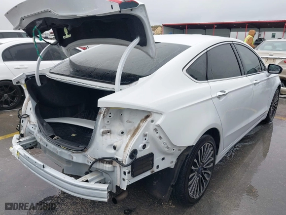 2018 Ford Fusion Titanium with VIN 3FA6P0D90JR247654, listed as a IAAI auction lot 41506643 with 100,907 mi miles. Bid and sale history available at carsss.com. Image 4.