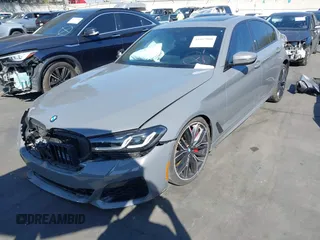 2022 BMW 5 Series M550i xDrive with VIN WBA13BK02NCJ61943, listed as a IAAI auction lot 41607980 with Not provided miles and . Bid and sale history available at DreamBid. Image 23.