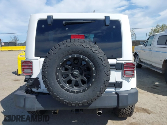 2017 Jeep Wrangler Unlimited Sahara with VIN 1C4BJWEG5HL588535, listed as a IAAI auction lot 42013571 with 70,012 mi miles. Bid and sale history available at carsss.com. Image 17.