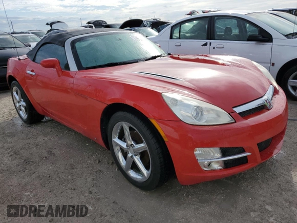 2009 Saturn Sky z VIN 1G8MN35B79Y103875, wystawiony jako Copart lot #74669844 z przebiegiem Nie podano mil oraz Szkody całkowita. Historia ofert i sprzedaży dostępna na DreamBid. Obrazek 4.