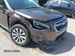 2019 Subaru Outback Touring with VIN 4S4BSATC7K3246765, listed as a IAAI auction lot 42793821 with 57,110 mi miles and . Bid and sale history available at DreamBid. Image 6.