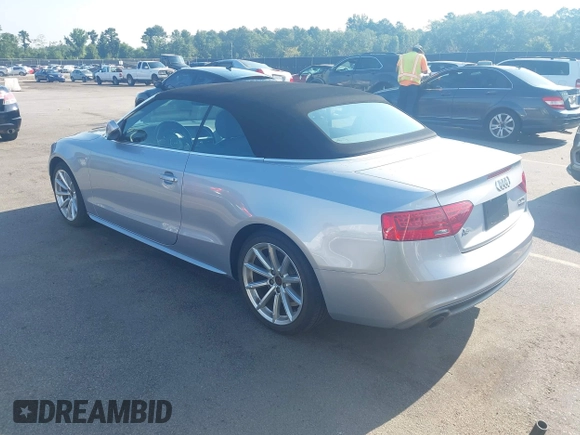 2016 Audi A5 Premium with VIN WAUD2AFHXGN005246, listed as a IAAI auction lot 42595647 with 56,602 mi miles and . Bid and sale history available at DreamBid. Image 3.