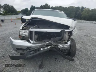 2000 Ford Super Duty F-250 XL with VIN 1FTNW21S1YED90136, listed as a Copart auction lot 71520914 with 378,931 mi miles and Salvage Title. Bid and sale history available at carsss.com. Image 5.