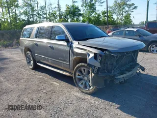 2019 Chevrolet Suburban LT with VIN 1GNSCJKC3KR129739, listed as a IAAI auction lot 42044708 with 105,771 mi miles and . Bid and sale history available at DreamBid. Image 1.