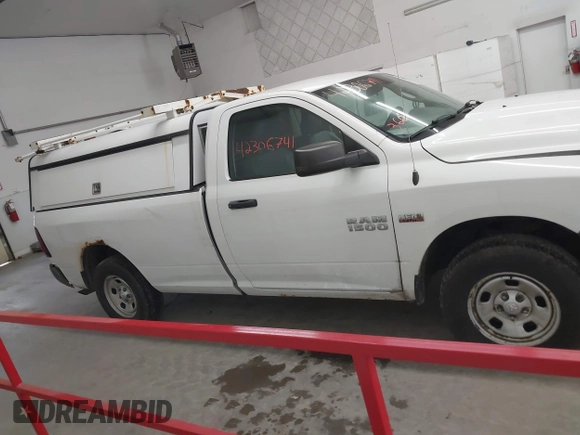 2014 Ram 1500 Tradesman z VIN 3C6JR7DT6EG285109, wystawiony jako IAAI lot #42306741 z przebiegiem 218 286 mil mil oraz . Historia ofert i sprzedaży dostępna na DreamBid. Obrazek 13.