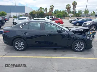 2021 Mazda 3 S with VIN 3MZBPAAL8MM254767, listed as a IAAI auction lot 42813614 with 31,704 mi miles and . Bid and sale history available at DreamBid. Image 13.