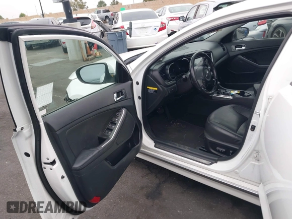 2014 Kia Optima EX with VIN KNAGN4AD1E5065133, listed as a IAAI auction lot 42157506 with 128,198 mi miles and . Bid and sale history available at DreamBid. Image 5.