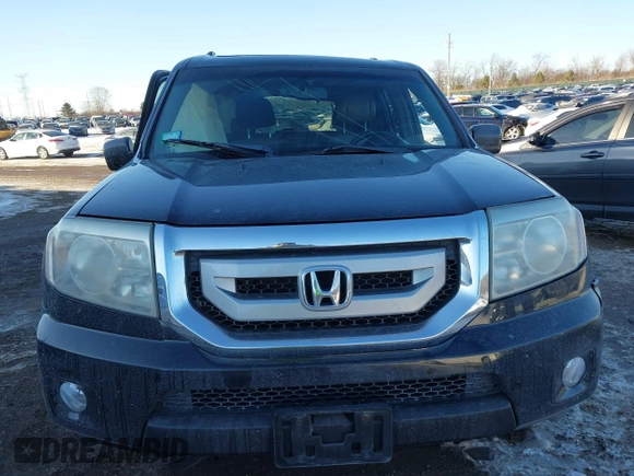 2009 Honda Pilot EX-L with VIN 5FNYF48649B026889, listed as a IAAI auction lot 41643289 with 121,511 mi miles and . Bid and sale history available at carsss.com. Image 12.