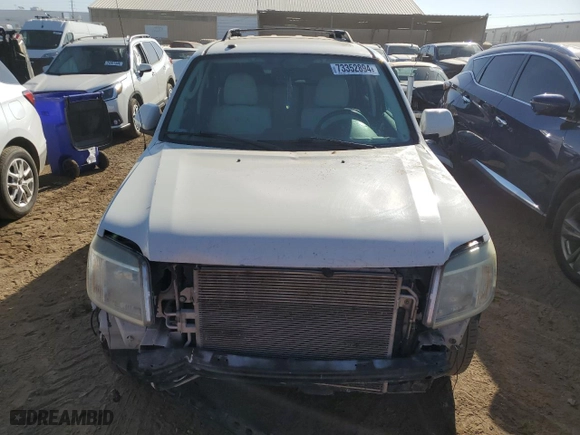 2010 Mercury Mariner Premier with VIN 4M2CN9H75AKJ14600, listed as a Copart auction lot 73352894 with 145,328 mi miles and Salvage Title. Bid and sale history available at carsss.com. Image 5.