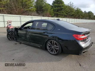 2018 BMW 7 Series M760i xDrive with VIN WBA7H6C53JG614984, listed as a Copart auction lot 73671322 with 28,191 mi miles. Bid and sale history available at carsss.com. Image 2.