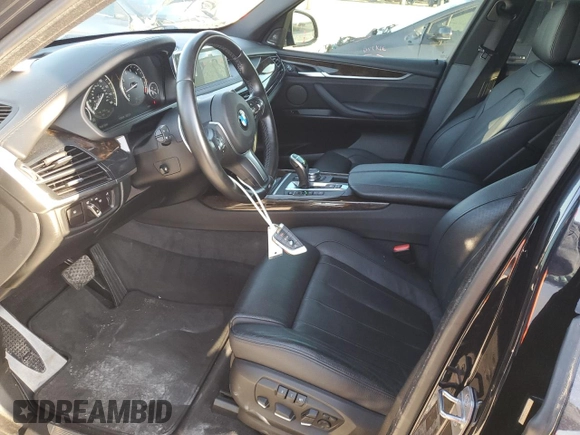 2017 BMW X5 xDrive35i z VIN 5UXKR0C55H0U51974, wystawiony jako Copart lot #52109755 z przebiegiem 128 540 mil mil oraz Szkoda całkowita • Salvage title. Historia ofert i sprzedaży dostępna na DreamBid. Obrazek 7.