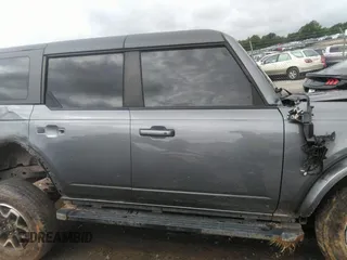 2023 Ford Bronco z VIN 1FMEE5BP0PLB18858, wystawiony jako IAAI lot #42487421 z przebiegiem 38 477 mil mil oraz . Historia ofert i sprzedaży dostępna na DreamBid. Obrazek 13.