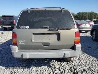 1998 Jeep Grand Cherokee Laredo with VIN 1J4FX58S7WC179728, listed as a Copart auction lot 77372224 with 0 mi miles and Clean Title. Bid and sale history available at carsss.com. Image 6.