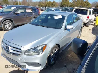 2014 Mercedes-Benz E-Class E 250 BlueTEC Luxury with VIN WDDHF0EB6EA967831, listed as a IAAI auction lot 41660612 with 187,041 mi miles. Bid and sale history available at carsss.com. Image 2.