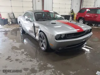 2014 Dodge Challenger SXT with VIN 2C3CDYAG2EH158682, listed as a IAAI auction lot 41298613 with 121,252 mi miles. Bid and sale history available at carsss.com. Image 1.